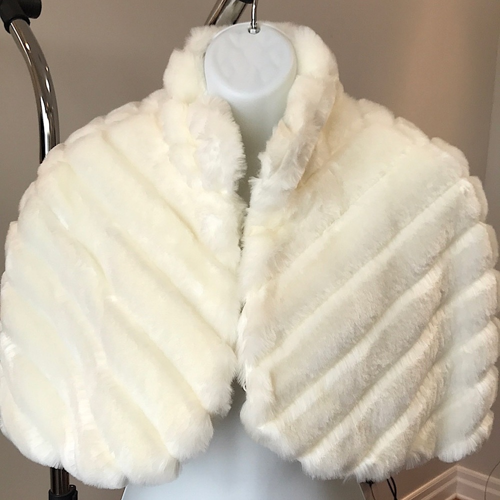 Bebe faux fur shoulder wrap.